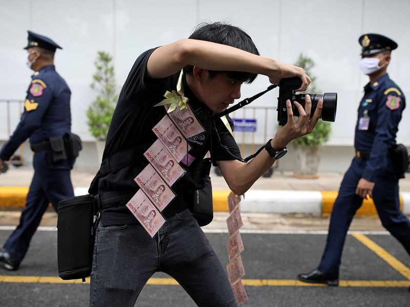 "Whatever it takes so that the hall is left with the smallest number of people," Suppanat said. "This is to send an indirect message that some of us are unhappy with the monarchy and we want change." The university did not respond to a request for comment. Image Credit: AFP